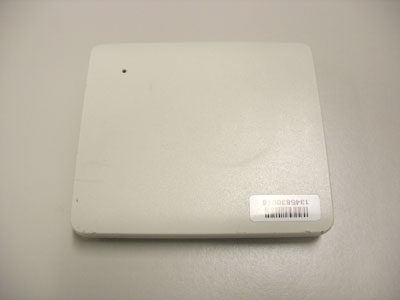The transponder is a small plastic square, about 3 inches wide, 3.5 inches long, and 0.5 inches tall. 