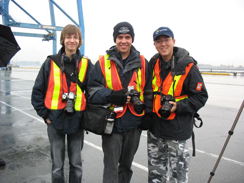 Chris Cassidy, George Prior, and David Lam, the photographers behind Trans-Vancouver. (They\'re wearing safety vests because the docks made us all wear them.)