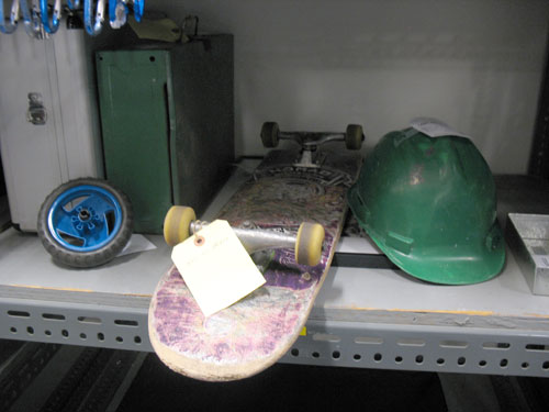 Skateboard, hard hat, blue wheel thing. If any of this is yours, get in touch!