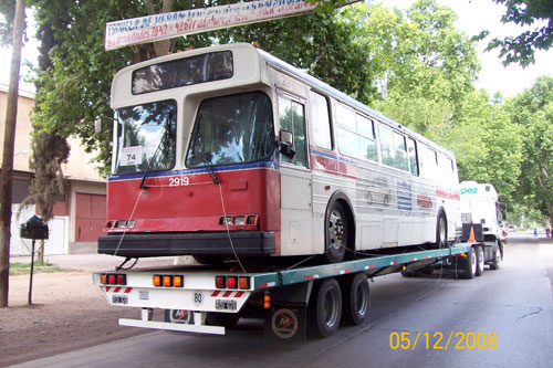 One of our retired trolleys on a flatbed truck, arriving in Guaymallen, Argentina en route to Mendoza.
