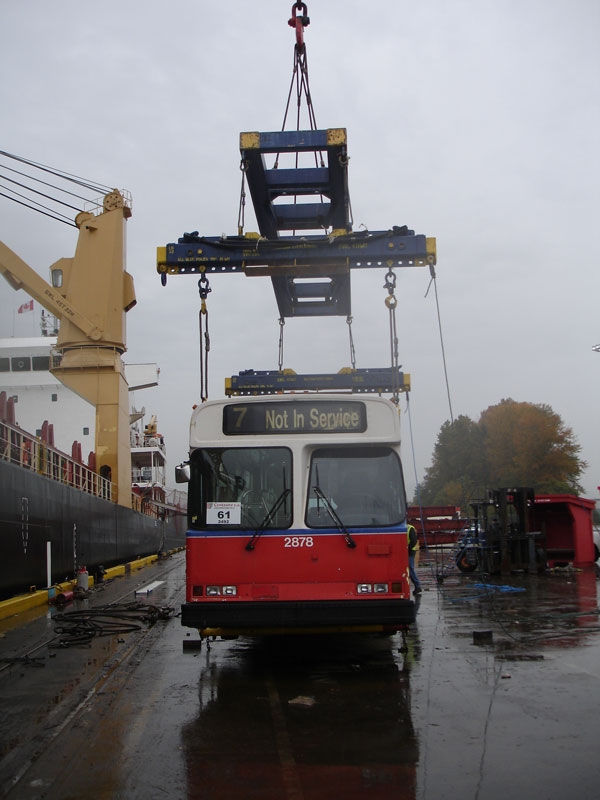 A trolley prepares to be hoisted onto the ship.
