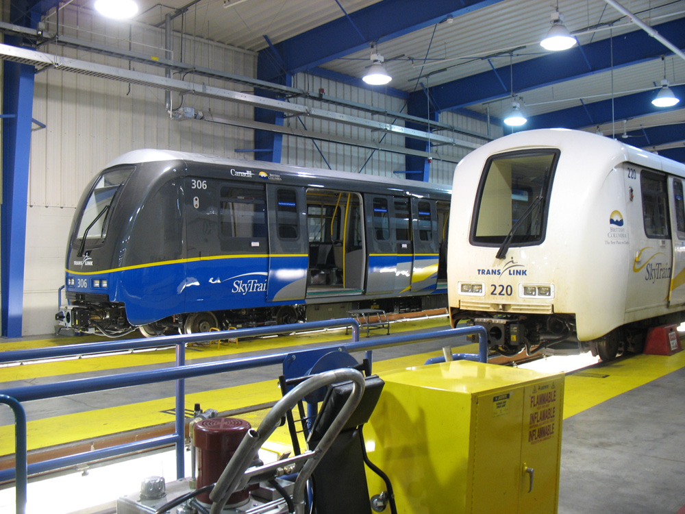 From 2009: two generations of SkyTrain car inside our operations and maintenance centre near Edmonds.