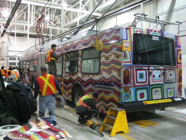 The Blanket Bus being wrapped with its afghan patterns.