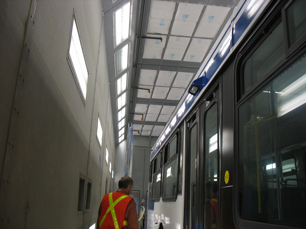 Inside the articulated bus paint booth.