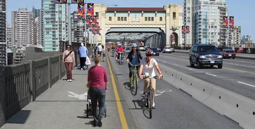A rendering of the Burrard Bridge bike lane trial, which starts on Monday. Photo from the <a href=http://vancouver.ca/projects/burrard/index.htm>City of Vancouver</a>.