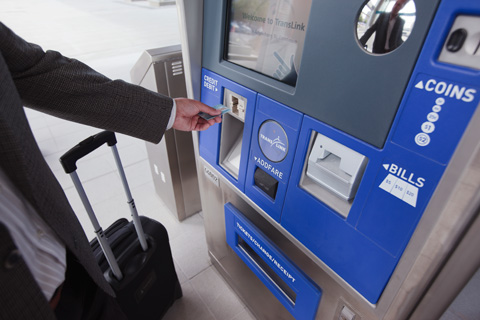 Canada Line ticket vending machines: hold your credit or debit card in the slot!