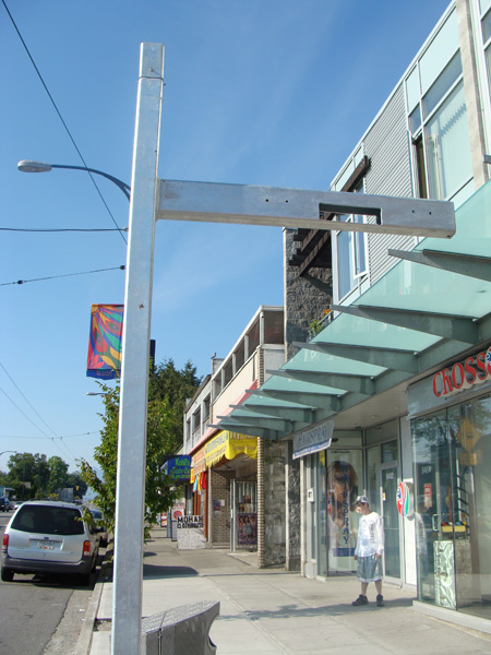 The metal poles at some Main Street bus stops will carry real-time bus arrival displays this fall.