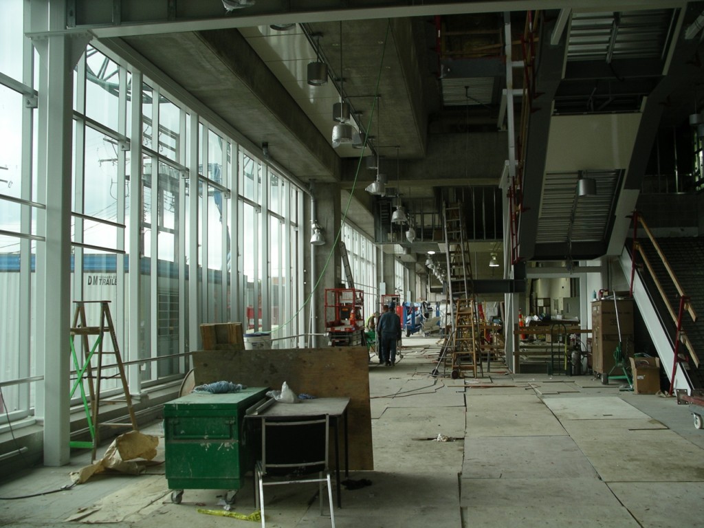 The interior of the station on the south side concourse. Floor tiles are being installed!