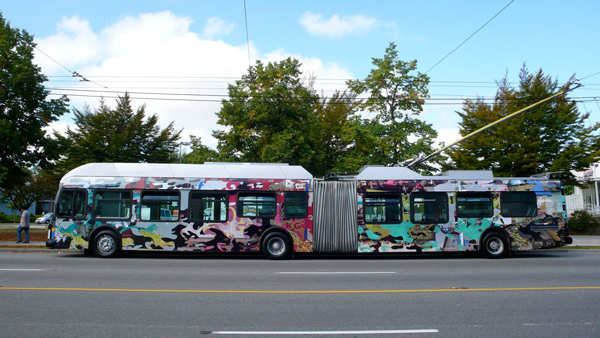 A bus wrap designed by Germaine Koh as part of five public art exhibits over two years on Main Street. See <a href=http://buzzer.translink.ca/index.php/2009/08/more-public-art-debuts-on-main-street/>this post</a> for more on Germaine's project, and <a href=http://buzzer.translink.ca/index.php/2009/01/main-street-public-art-program-has-its-official-launch/>this post</a> about the first installation in the public art program.