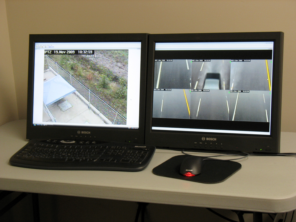 Two screens show video that is used in quality assurance checks.