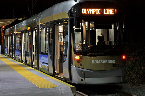 The Olympic Line streetcar by night. By <a href=http://www.flickr.com/photos/dennistt/4294996818/in/set-72157623134999211/>DennisTT</a>.
