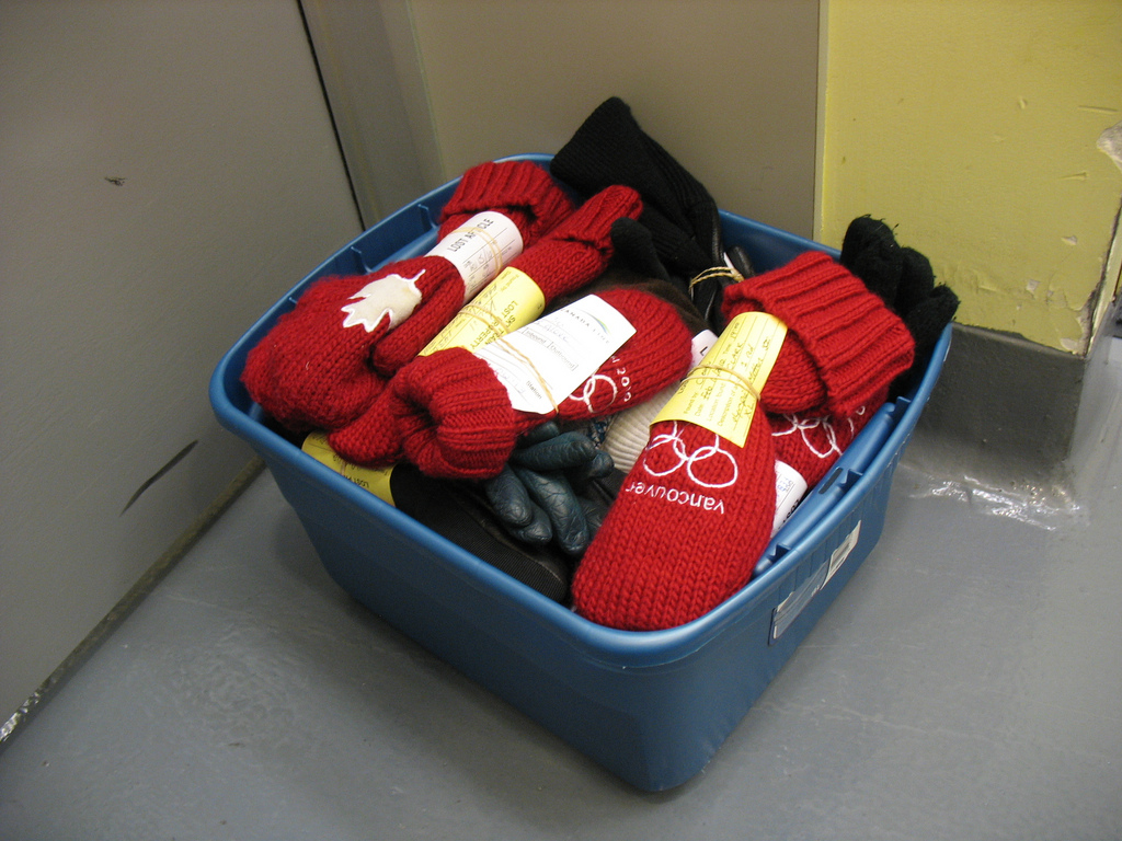 A box of single mittens found on transit. How sad!