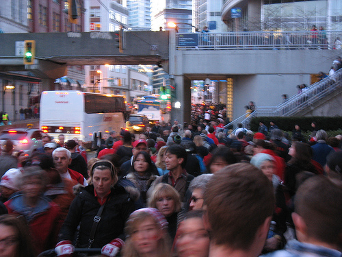 The crowds heading west toward Waterfront Station along Cordova St.