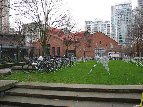 The bike valet racks. Fencing surrounds the entire bike rack space.