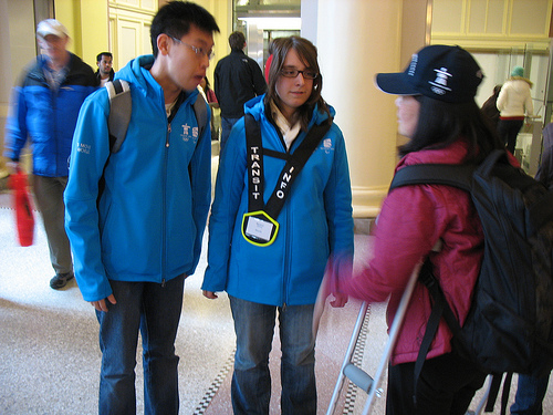 Transit hosts William and Michelle help out a customer looking for the Vancouver Art Gallery.