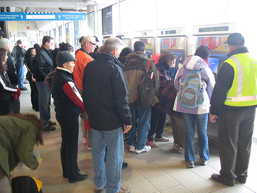 Crowds using the ticket machines at Bridgeport Station.
