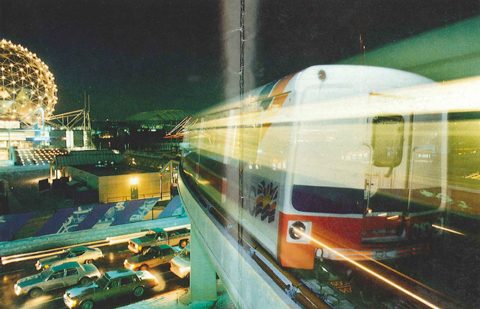 Ghostly SkyTrain soars above Vancouver! From the cover of the SkyTrain Flight Plan leaflet. 