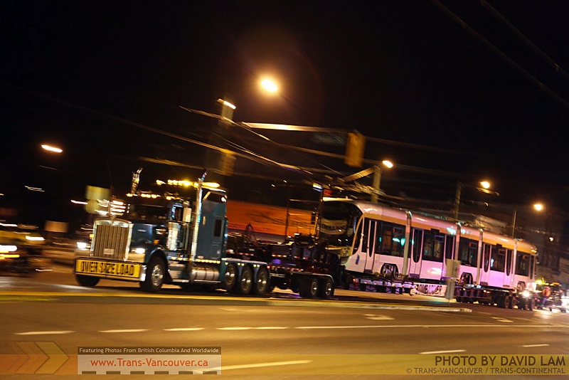 One of the Flexity streetcars being taken to Tacoma, to be shipped home to Brussels! Photo by <a href=