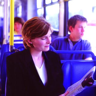 woman_on_bus_reading