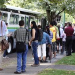 Waiting to load onto the bus for the bus boarding game.