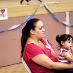 A mother and daughter enjoy the night.