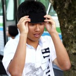 A blindfolded volunteer playing the bus boarding game.