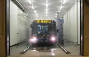 A bus in the car wash at Surrey Transit Centre.