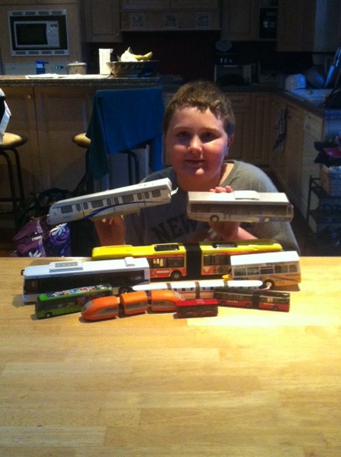 Trevor and his collection of bus models!