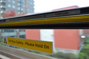 The 'yellow strip' silent alarm found on every window on SkyTrain