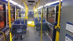 The interior of the new CNG bus showing the courtesy screens 