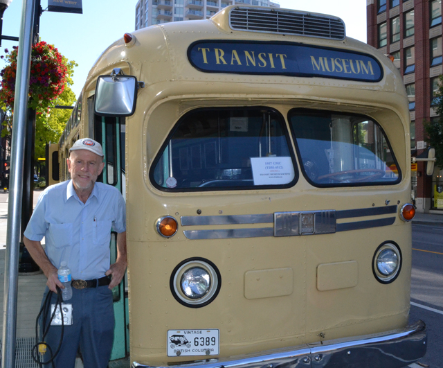Angus next to a 1957 GMC bus