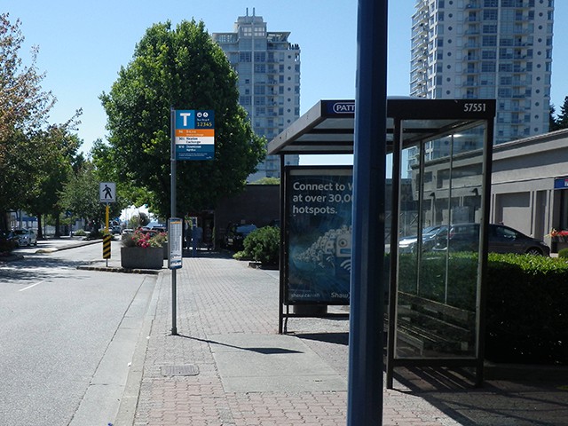 A wayfinding expert’s rendering of a new bus stop sign and scheduling panel