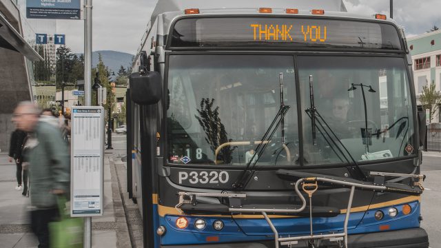 Photo of a bus that says Thank You in the bus blind area