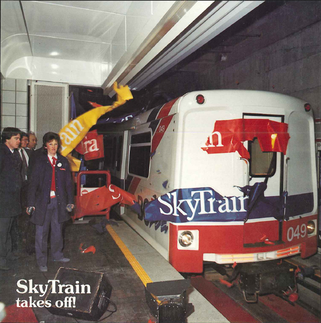 The SkyTrain bursting through a banner on opening day.
