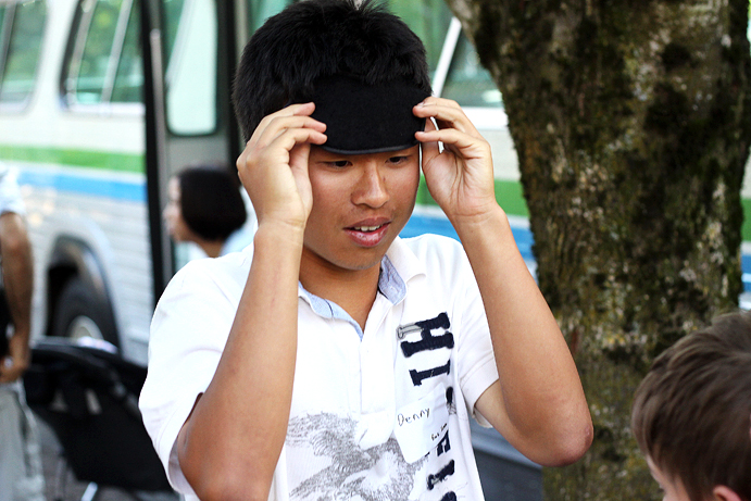 A blindfolded volunteer playing the bus boarding game.