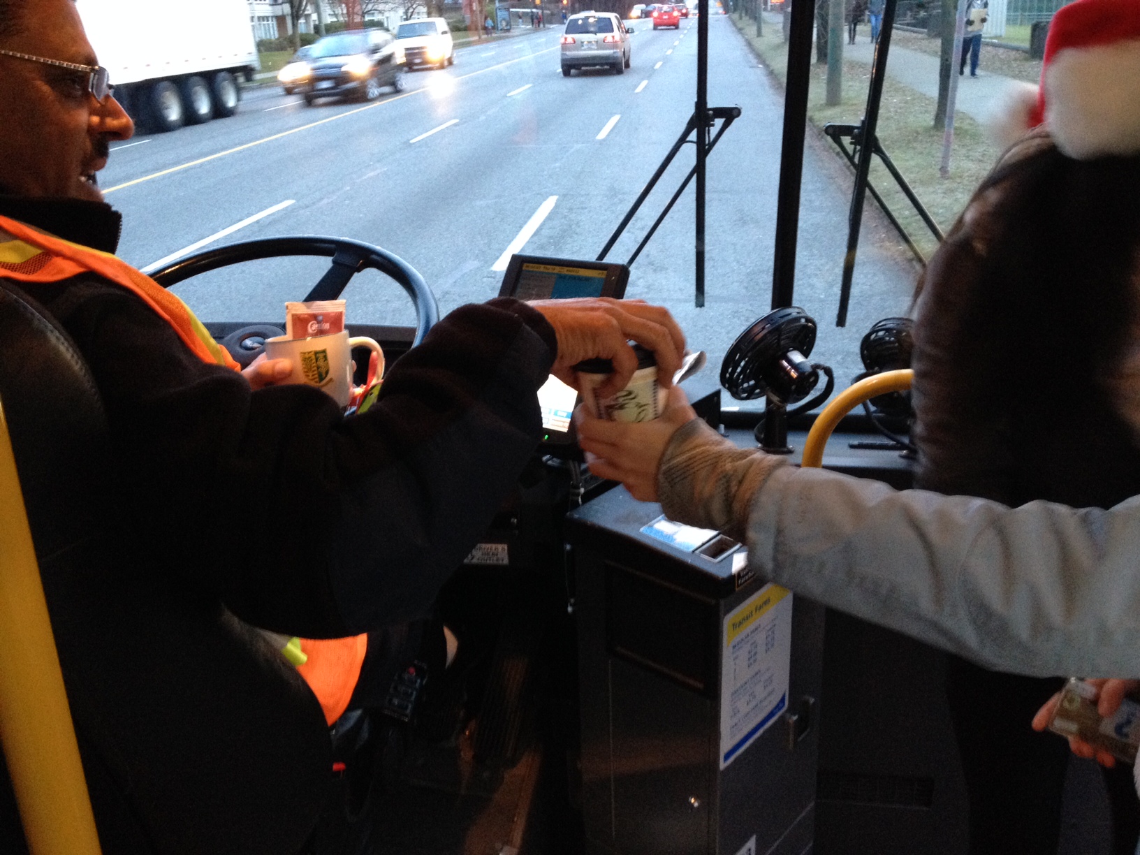 A bus operator gets some hot cocoa