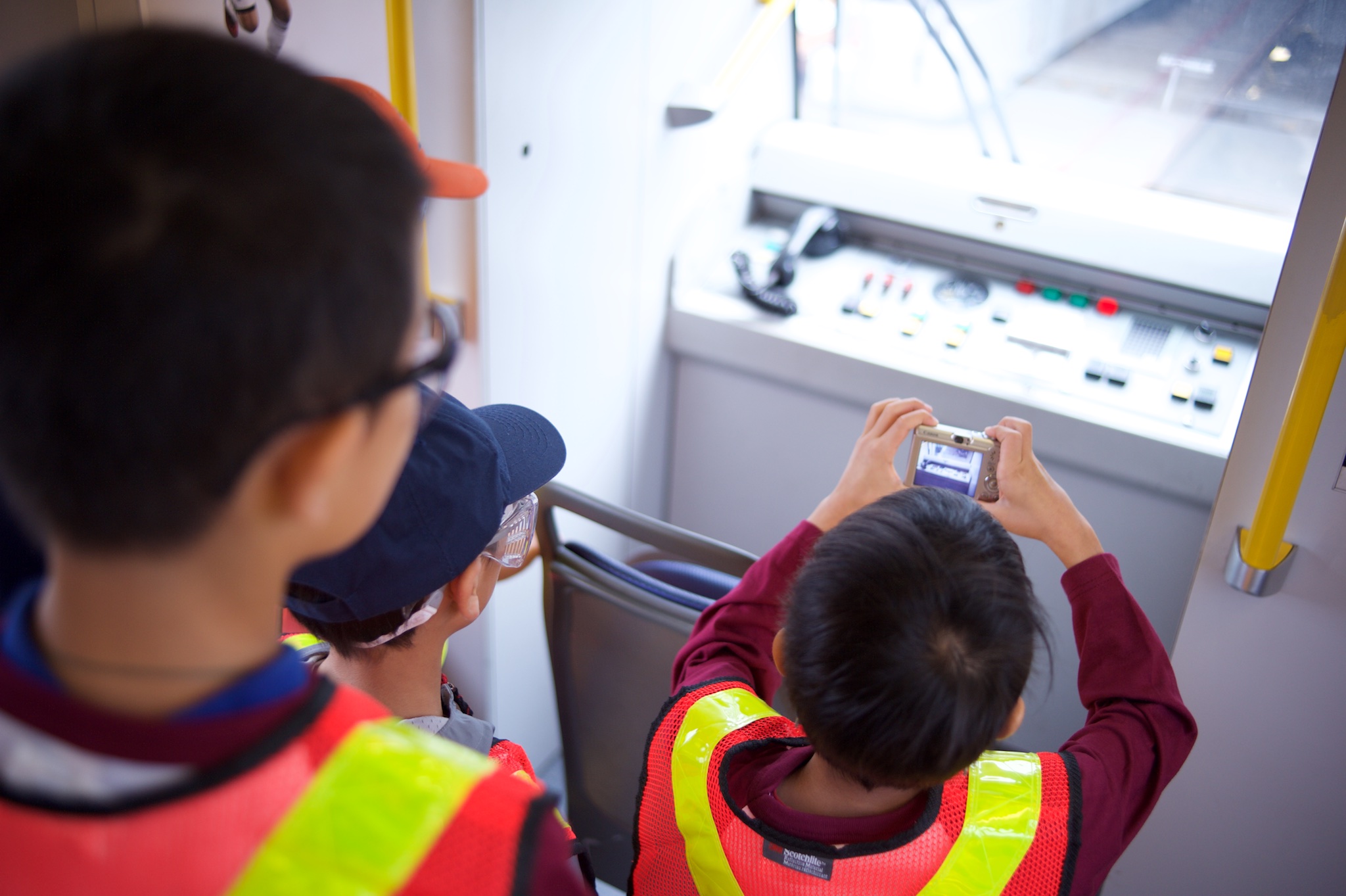 Campers rode a SkyTrain in the yard and got to see the manual control panel!