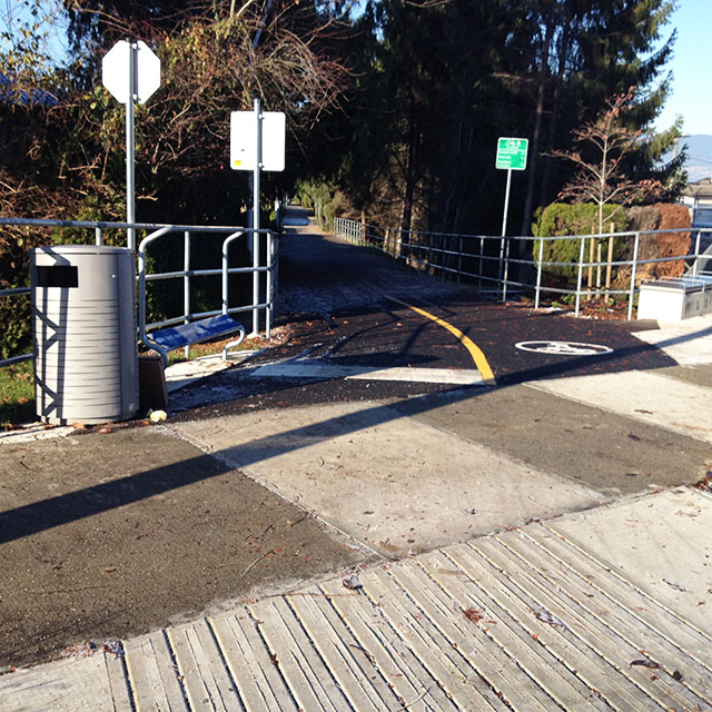 New street signs and accesible path at Slocan Plaza