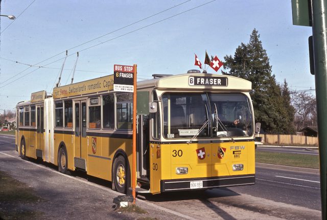 Hess articulated trolley demonstrator on loan from Berne, Switzerland in 1974. Shown at Cambie and 64th terminus. Note bus information number is Amherst 1-4211.