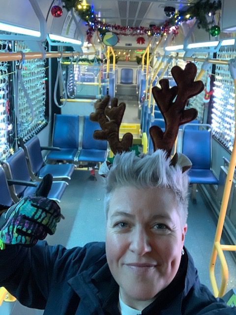 Bus operator Erika Jensen poses for a photo onboard the Reindeer Bus