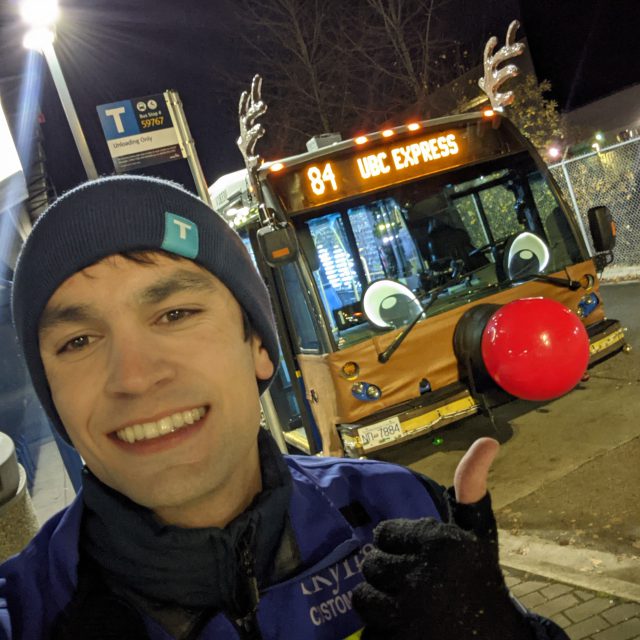Kyle takes a selfie showing off the reindeer bus