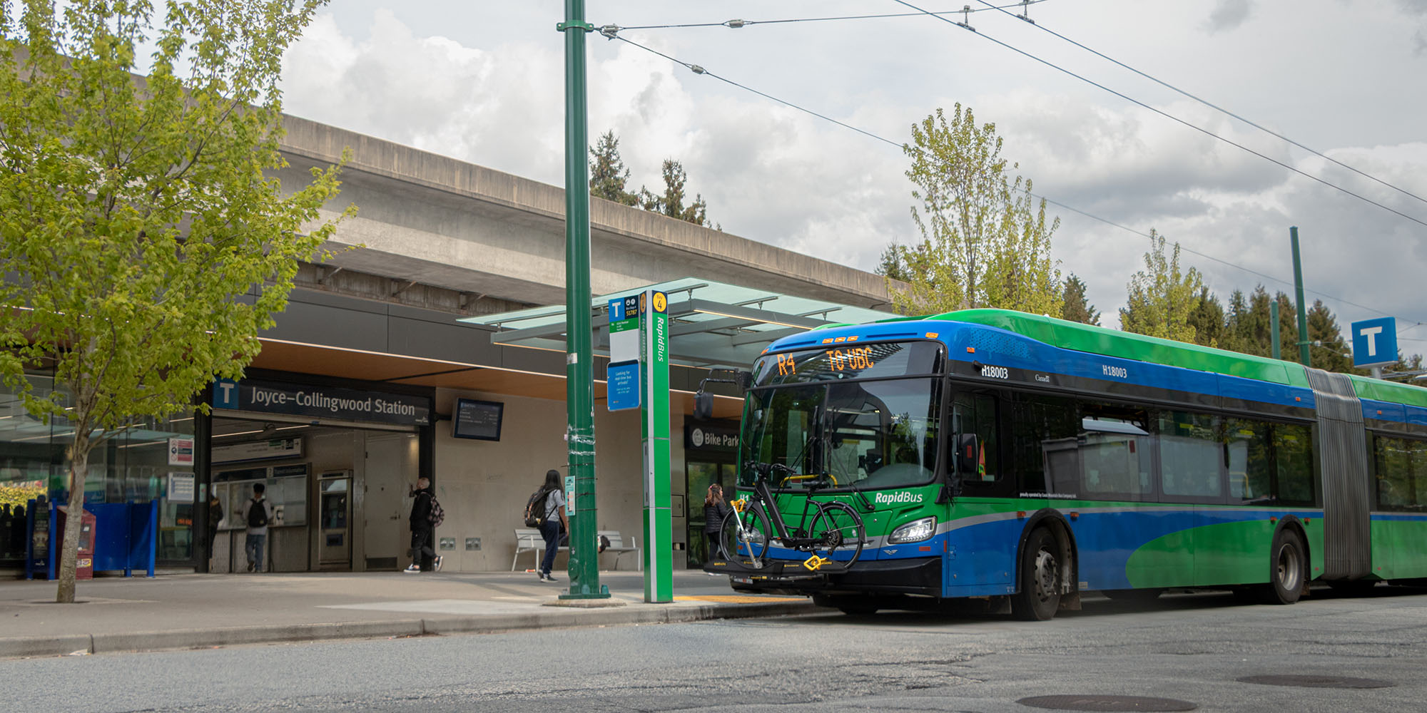 R4 41st Ave RapidBus, one of TransLink's top 10 bus routes, picks up passengers outside Joyce–Collingwood Station
