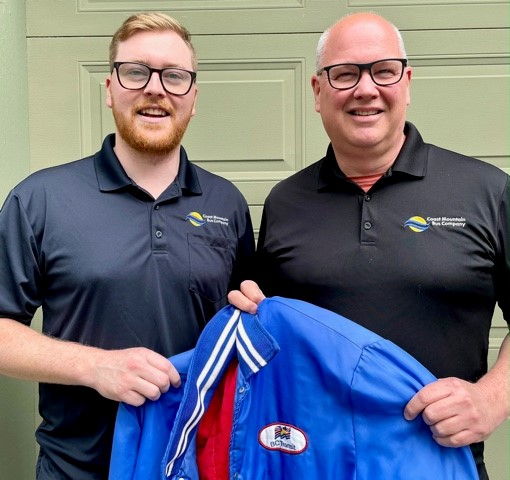 Colin and Ross pictured holding Ray Blamey's BC Transit jacket​