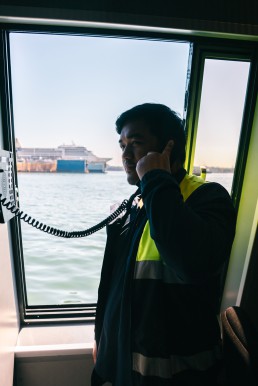 A SeaBus attendant on the phone