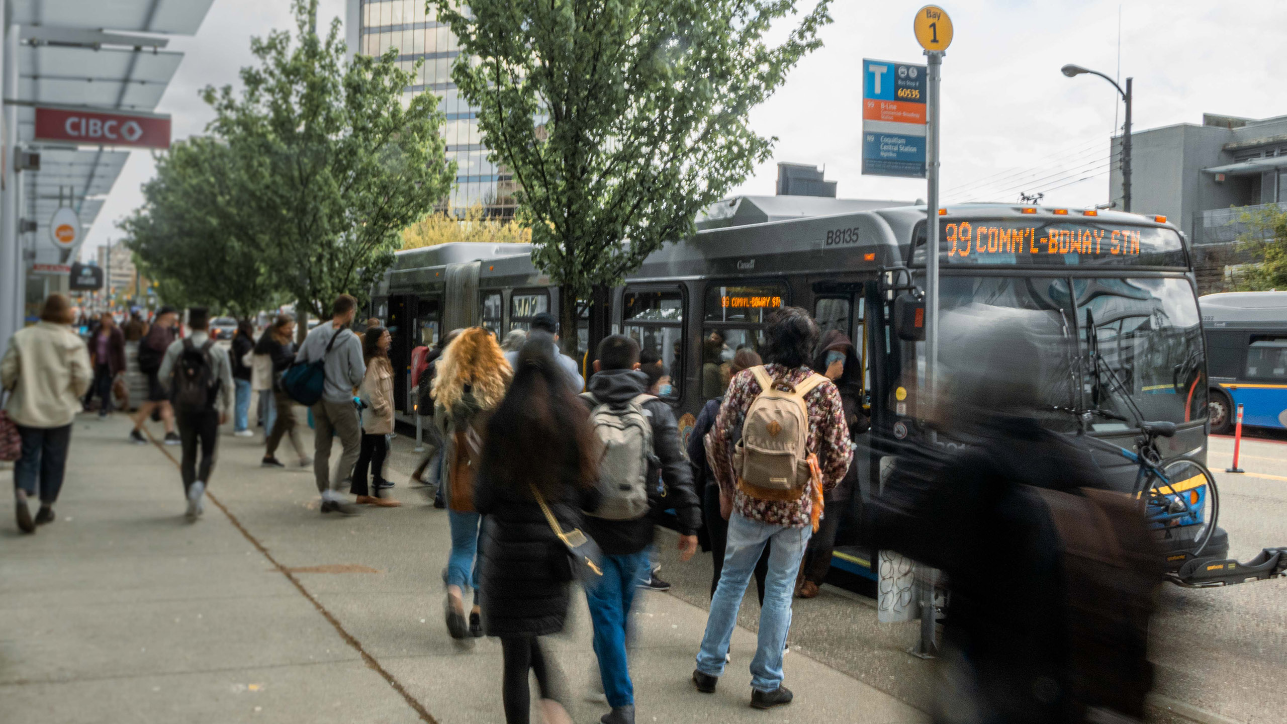 The 99 B-Line, one of TransLink's top 10 bus routes boards passengers at a stop in Metro Vancouver