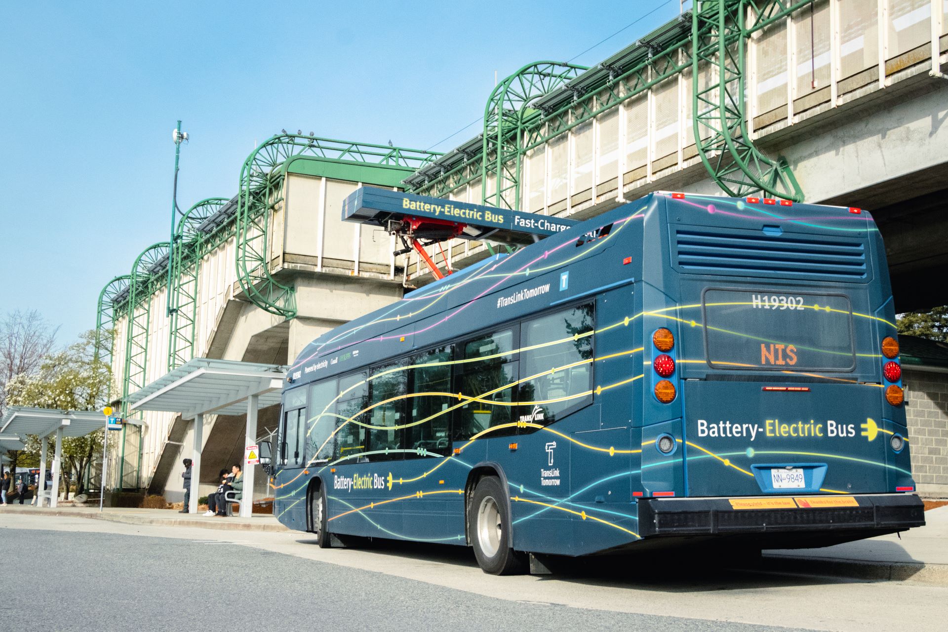 A battery-electric bus charging at 22nd Street Station