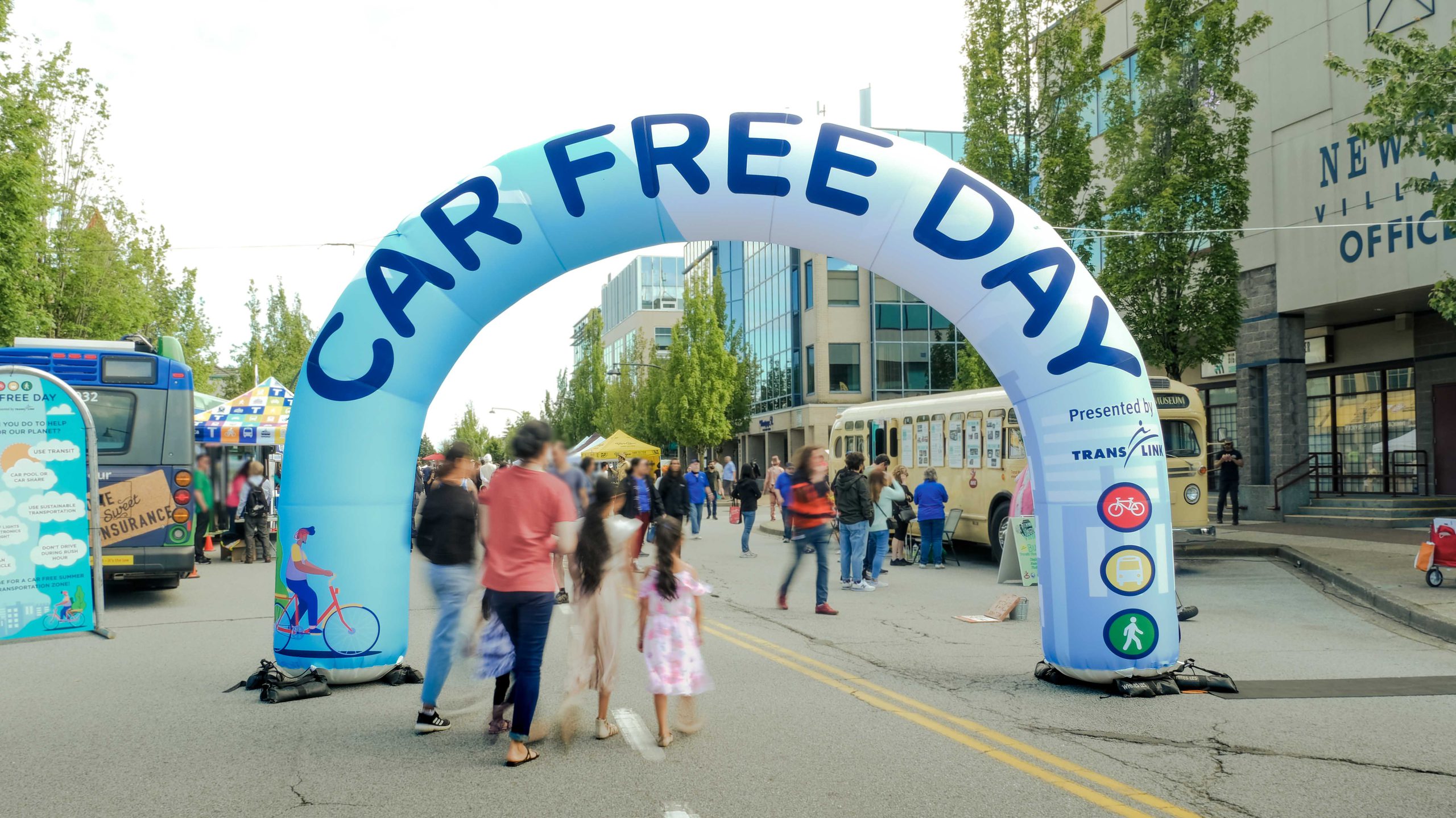 An inflatable arch entrance with the Car Free Day graphic