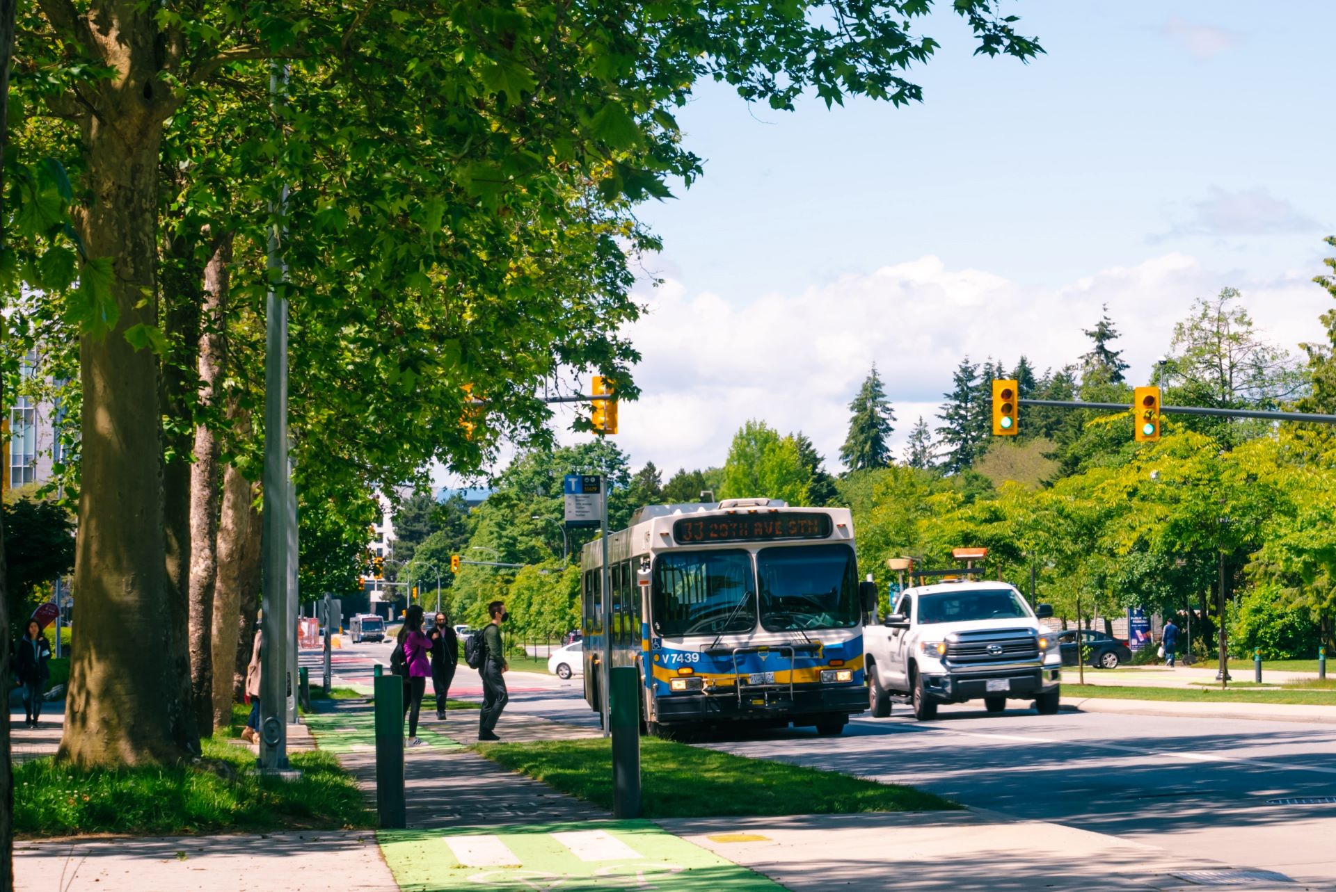 The 33 bus travelling along Westbrook Mall at UBC