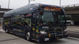 Battery-electric bus with 100% Electric on the destination sign