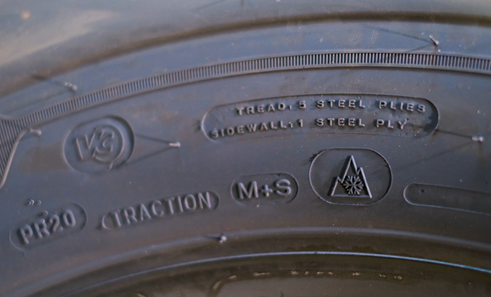 TransLink tire with 3-Peak Mountain Snowflake symbol
